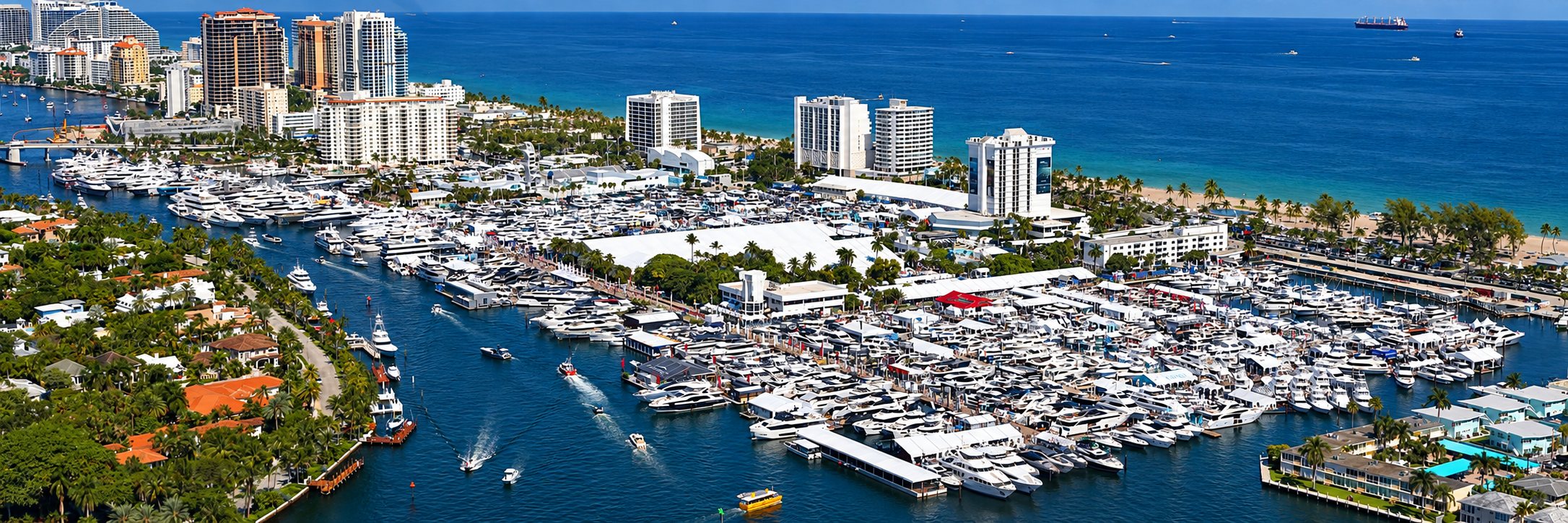 Aerial view of the Fort Lauderdale International Boat Show, with yachts filling the marinas along the Intracoastal and the beach and ocean beyond