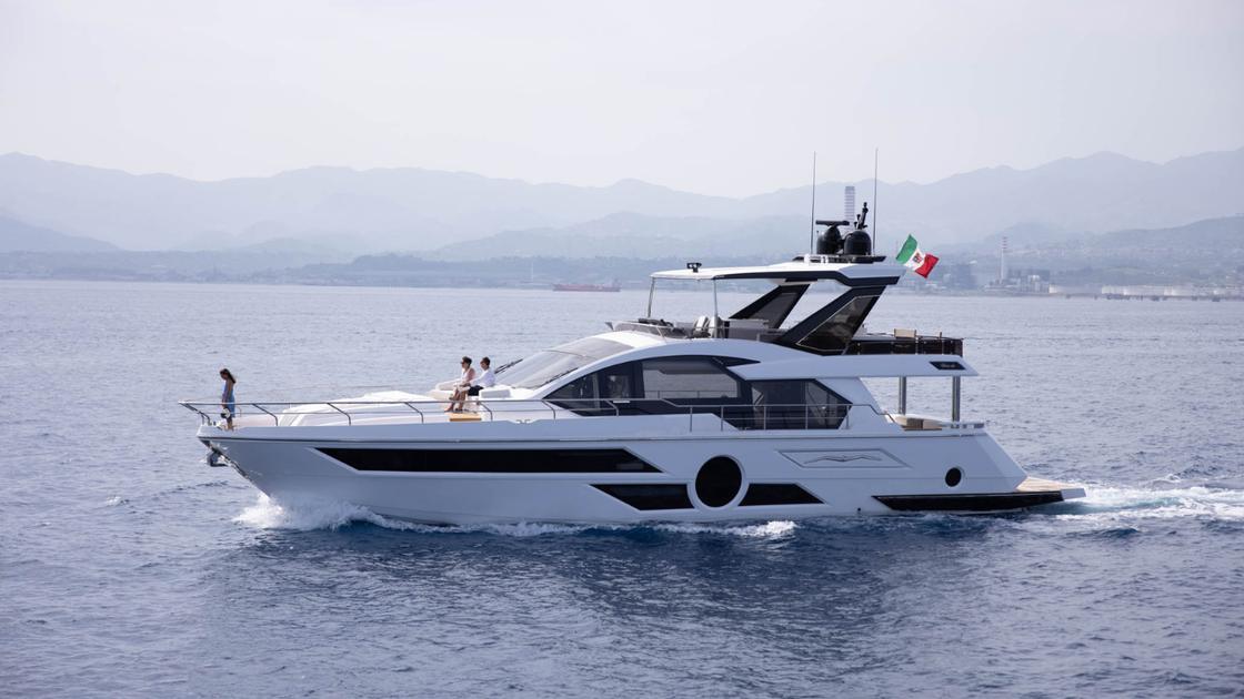 2023 Aicon 66 flybridge motor yacht underway